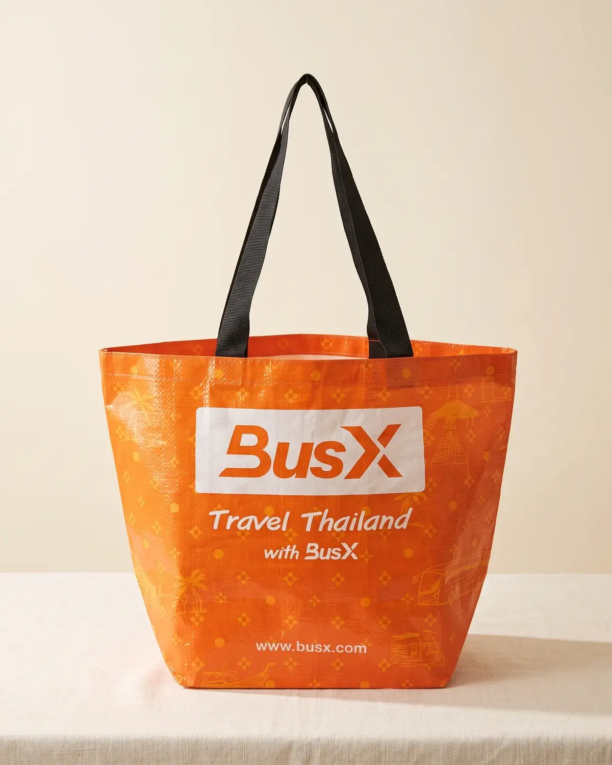 ถุงกระสอบพลาสติกสีส้ม BusX Travel Thailand ผลิตโดยโรงงาน CDV
